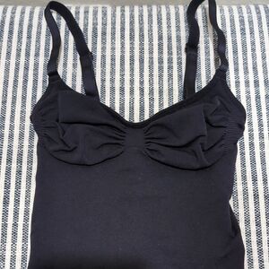 SKIMS Seamless Sculpt Thong Bodysuit in Onyx (black)